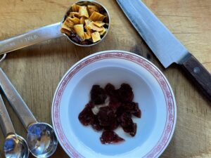 Shows how to soak dried fruit before mixing with Yumbini to make it even more delicious with no added sugar.