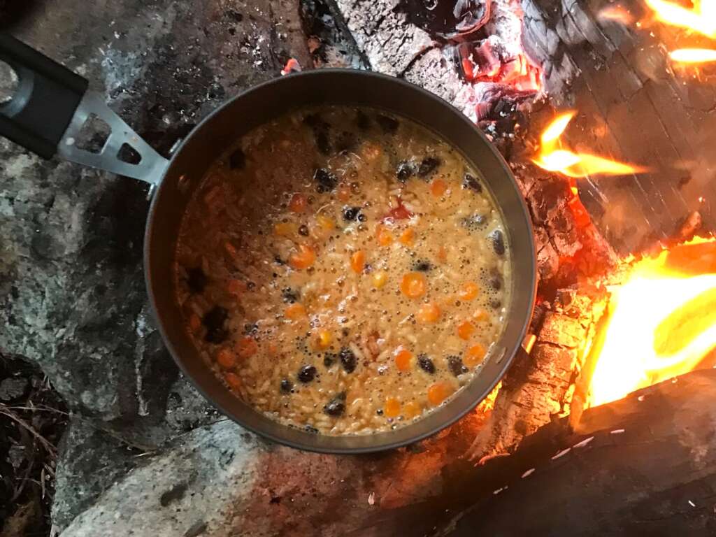 Yumbini is perfect for camping! You can even cook it over a campfire or barbecue. All you need is a pot and water.