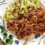 Yumbini Cowboy BBQ Pinto Beans and Rice is slightly sweet from dried apples (not sugar!). It pairs well with bitter greens such as cabbage, chard, collards and kale.