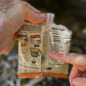 Measure the water in the empty pouch.