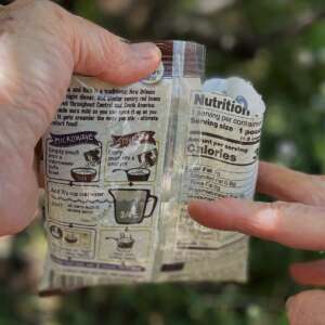 Measure the water in the empty pouch, no need for a measuring cup.