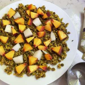 Many kinds of fruit taste great with Yumbini Curried Lentils quick lentils and rice. Examples are peaches, mango, melon, plums, apricots, grapes and raisins.